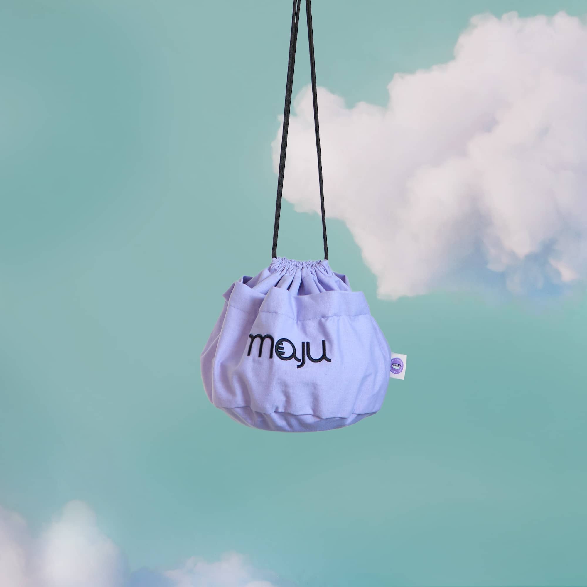 Vue de face du sac de transport maju en coton et de couleur violet.